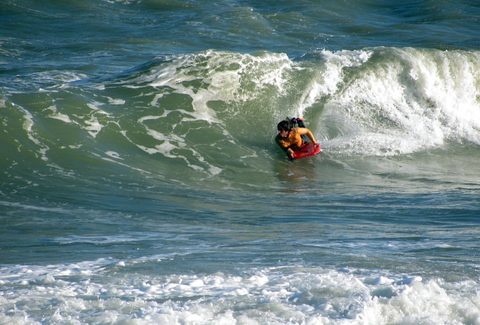 bodyboarding with the waves