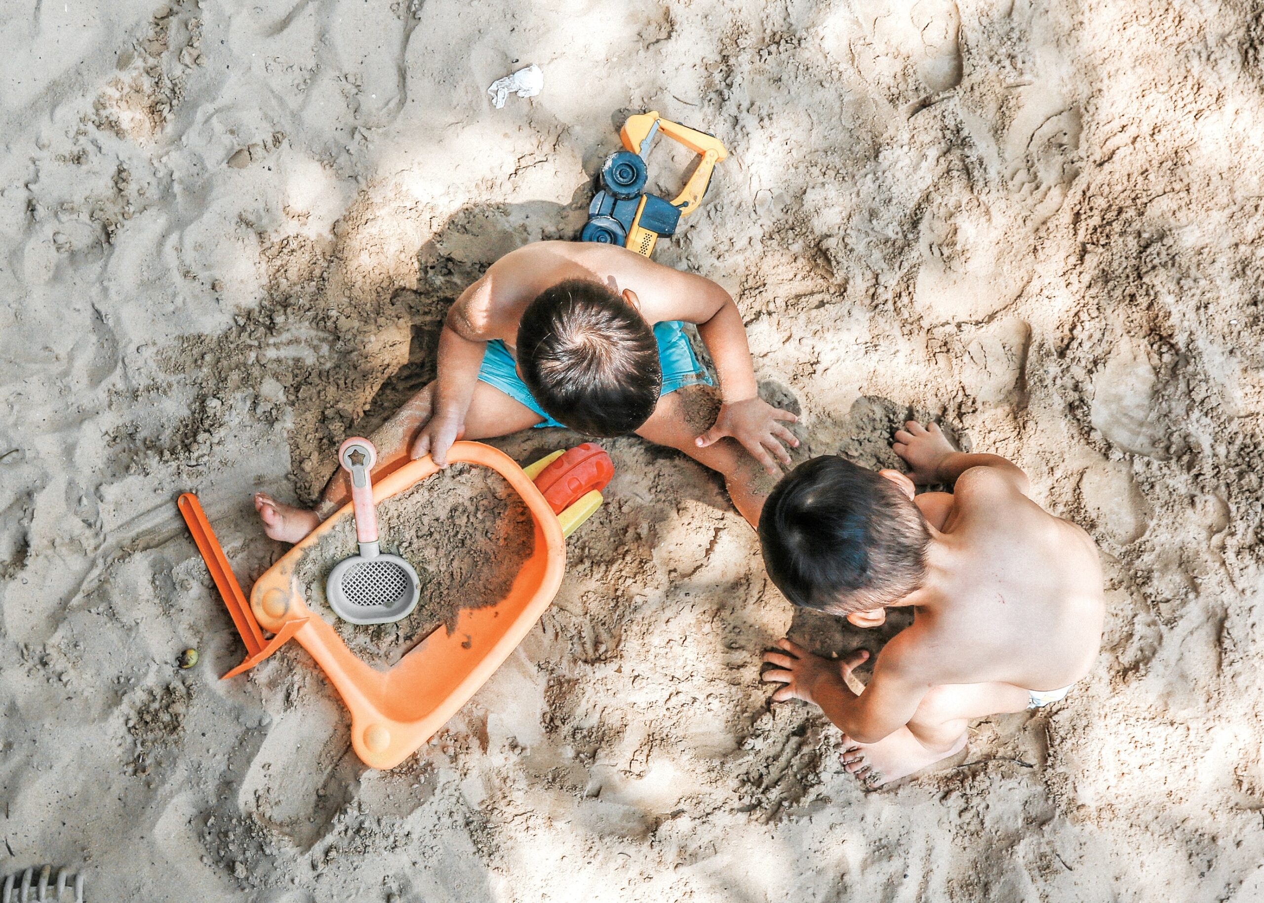 Children building sand castles